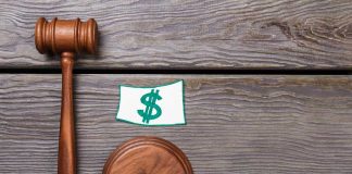 Evolution’s Pennsylvania studio hit with second fine Gavel and dollar sign representing fine
