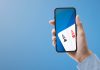 AppsFlyer: Casino and gambling app downloads up by over 100% in 2024 Mobile with playing cards represent a casino app