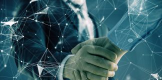 Hub88 expands aggregation hub via Belatra Games Businessmen handshake