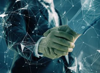 Hub88 expands aggregation hub via Belatra Games Businessmen handshake