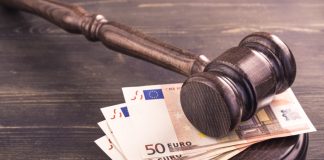 KSA issues over €1m fine to Winning Poker Network Euros under a gavel representing KSA's decision to fine Winning Poker Network