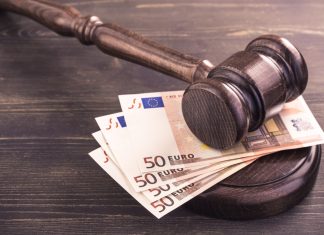 KSA issues over €1m fine to Winning Poker Network Euros under a gavel representing KSA's decision to fine Winning Poker Network