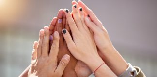 LeoVegas becomes Women in Tech partner to promote gender equality Women putting hands together