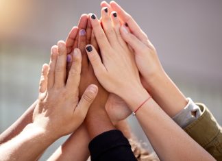 LeoVegas becomes Women in Tech partner to promote gender equality Women putting hands together