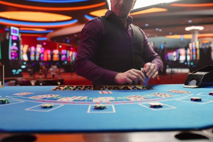 Casino dealer deals cards