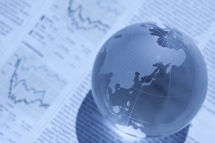 Global Globe sat on newspaper