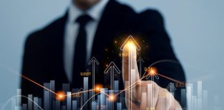 YOLO praises Bitblox’s innovation amidst investment move Businessman pointing at graph going up