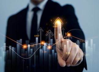 YOLO praises Bitblox’s innovation amidst investment move Businessman pointing at graph going up