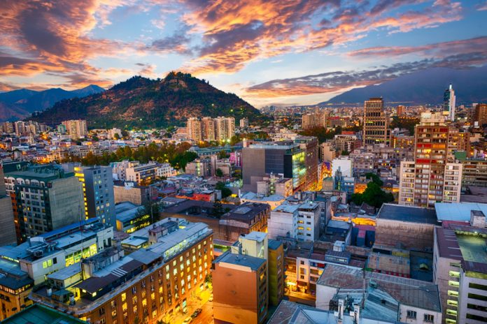 Latin American landscape Santiago de Chile dwontown after sunset, Chile