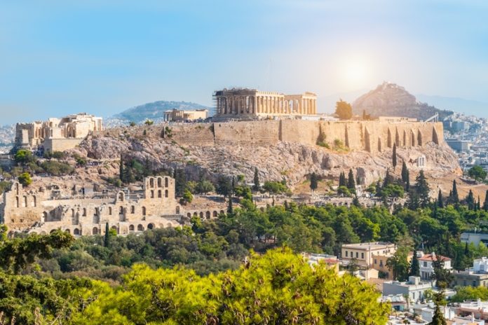 Greece Panoramic view of Athens with Acropolis hill on a hot summer day in Greece.