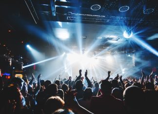 Shuffling the deck – The gig that almost left John Chyriwsky shoeless Silhouette of a music crowd