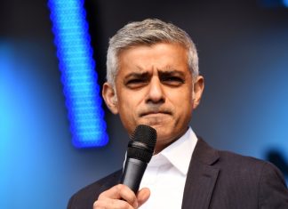Sadiq Khan accused of “backtracking” on gambling promise Sadiq Khan holding a microphone