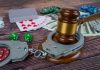Rising illegal casino raids heighten Australia’s black market concerns Handcuffs around poker chips