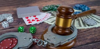 Rising illegal casino raids heighten Australia’s black market concerns Handcuffs around poker chips