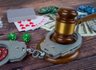 Rising illegal casino raids heighten Australia’s black market concerns Handcuffs around poker chips
