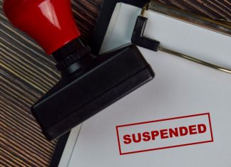 Connecticut suspends High 5 Games amid illegal casino allegations Suspended stamp on white paper