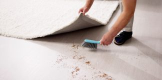 Regulatory Rundown: Sweepsing it under the carpet Man sweeping dirt under a rug