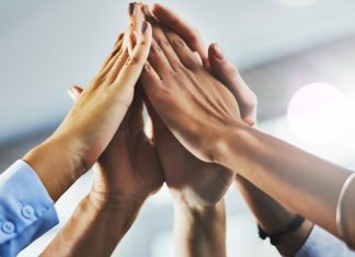 High 5 committed to “cooperation and transparency” in unlicensed casino probe Hands raised together