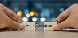 OneCasino boosts offering with Swintt content Puzzle pieces with the word partnership on them