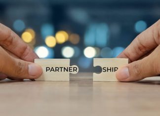 OneCasino boosts offering with Swintt content Puzzle pieces with the word partnership on them