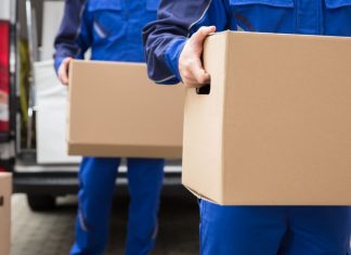 Malta regulator removes GoldWin licence Removal men take boxes out