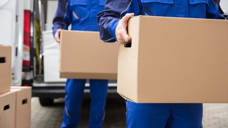 Malta regulator removes GoldWin licence Removal men take boxes out