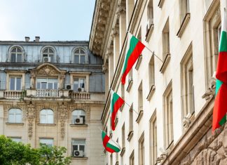 Bulgaria expands self-exclusion minimum period to one year Bulgaria flags on the outside of a building
