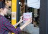 XLMedia proposes £11m tender for shareholders ahead of shutdown Women putting closing down sign on window