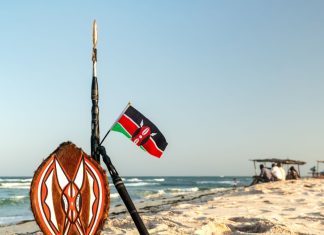 Kenya’s regulator downplays gambling spend claims Kenya flag on beach