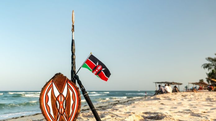 Kenya regulator downplays spend claims Kenya flag on beach
