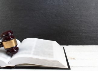DraftKings accused of “luring naive gamblers” in new lawsuit Gavel and open law book