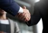 Delta Bingo taps Strive Gaming for digital relaunch Businessmen shaking hands