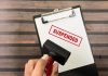 Brazil regulator suspends four licenses for ordinance failings Red suspended stamp