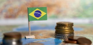 CreedRoomz: Brazil holds so much potential for live casino gaming Brazil flag next to a stack of coins