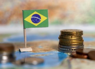CreedRoomz: Brazil holds so much potential for live casino gaming Brazil flag next to a stack of coins
