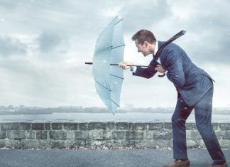 Pontus Lindwall, Betsson: Education needed to avoid harsh regulatory headwinds Businessman with an umbrella is facing strong headwind, like the industry is facing from legislators