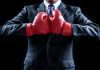 Codere Online to fight delisting from Nasdaq Stock Market Businessman with boxing gloves as Codere Online will fight its delisting from the Nasdaq Stock Market