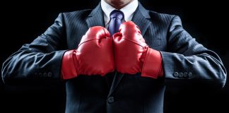 Codere Online to fight delisting from Nasdaq Stock Market Businessman with boxing gloves as Codere Online will fight its delisting from the Nasdaq Stock Market