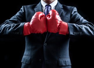 Codere Online to fight delisting from Nasdaq Stock Market Businessman with boxing gloves as Codere Online will fight its delisting from the Nasdaq Stock Market