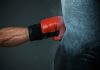 AUSTRAC expands financial crime fightback A boxing glove punches a punch bag as AUSTRAC fightback against financial crime