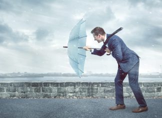 Playtech positive about Latin America despite 2025 headwinds Businessman with umbrella in the wind as Playtech has experienced initial headwinds in several Latin American regions in early 2025