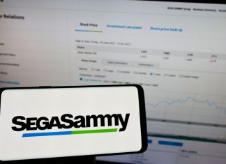 Sega Sammy completes Stakelogic acquisition despite criminality concerns Sega Sammy logo shown on a phone screen