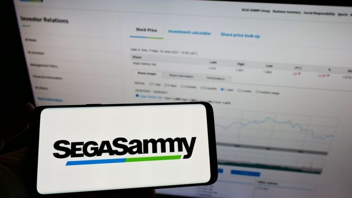 Sega-Sammy-Stakelogic-acquition Sega Sammy logo shown on a phone screen