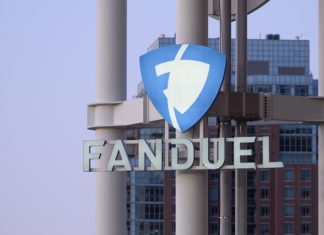 FanDuel unveils predictive depositing tool FanDuel's logo attached to the side of a tower, the company behind the new RG tool