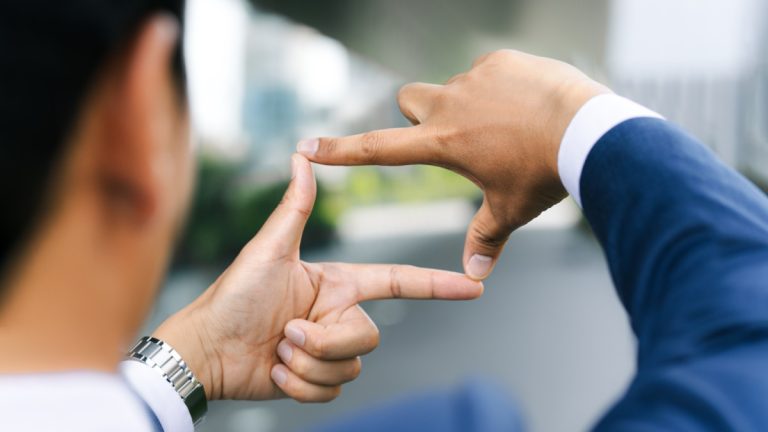 Gamzix appoints new Head of Commercial to boost regulated market focus Businessman creates a rectangle out of his fingers to focus his view