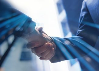 3 Oaks Gaming boosts global reach with EGT Digital partnership Two businessman shake hands