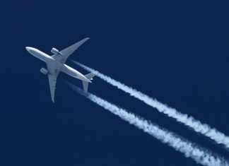 Online casino continues to soar in Denmark A plane soars into the sky with a trail behind it