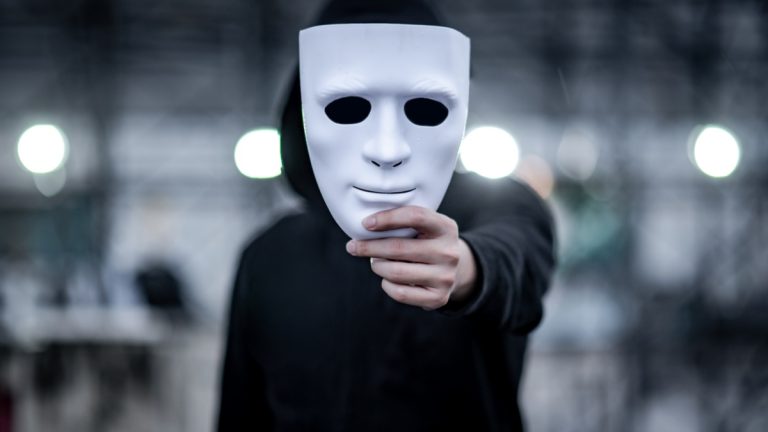 PAGCOR enhances efforts against infiltration of bad actors Actor disguising his face with a white mask