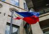 PAGCOR issues stark fraudulent license warning Philippines flag waves in the wind
