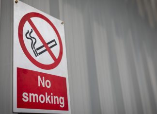Rhode Island casino workers push for smoking ban A no smoking sign on a wall, something casino workers in Rhode Island hope to see